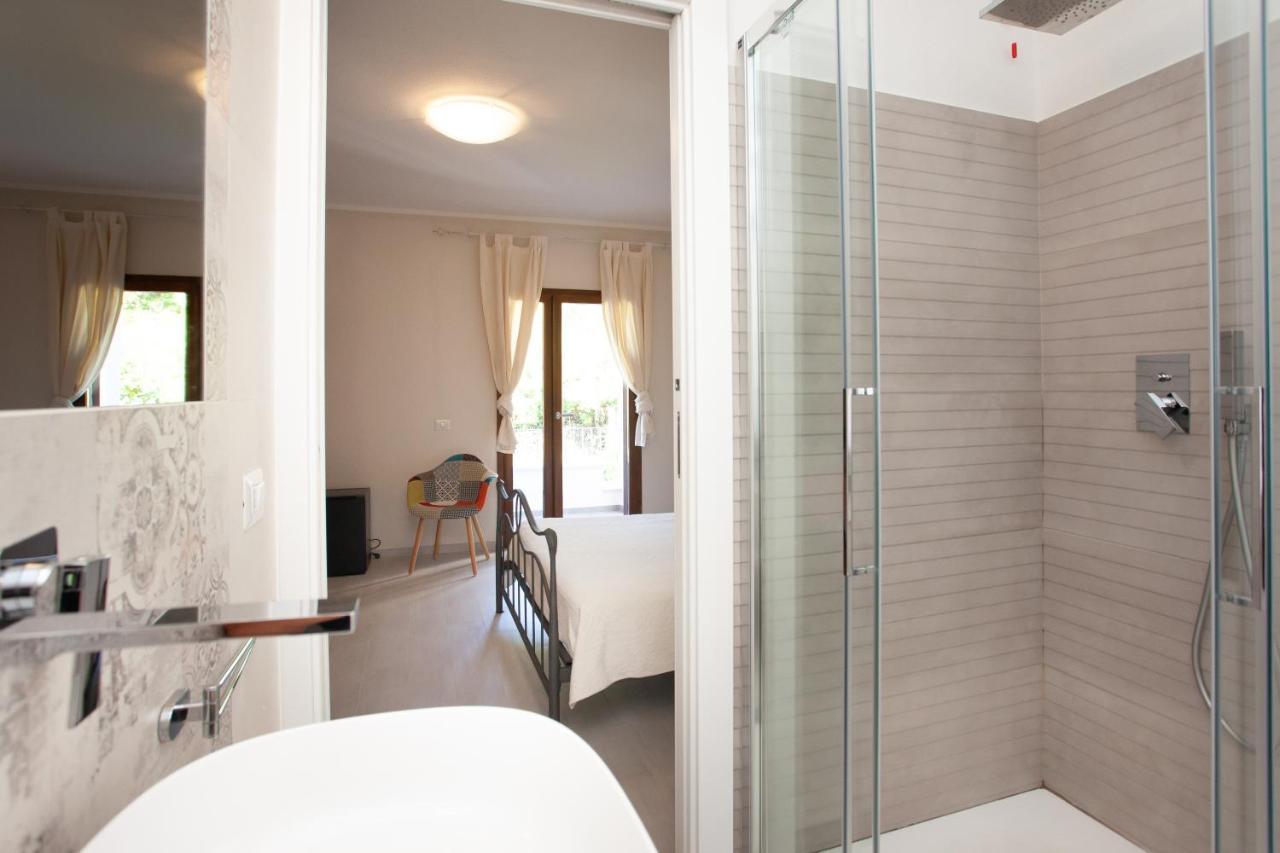 Lu Lioni Rooms Сан Теодоро Екстериор снимка